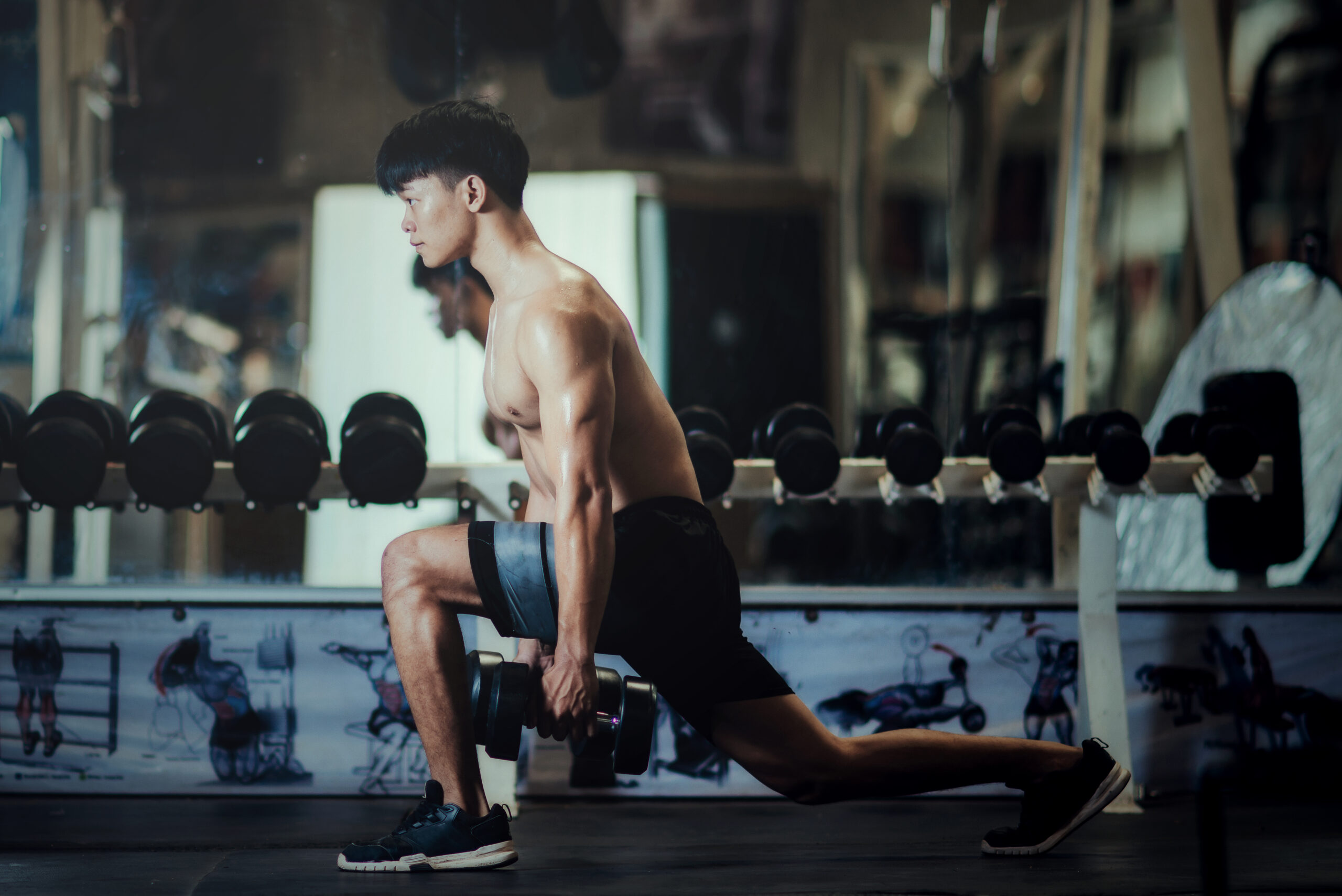 Strong bodybuilder with perfect deltoid muscles, Close-up of a H
